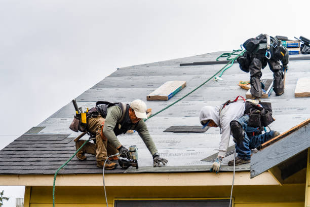 Professional Roofing technician working in Tylersport, PA